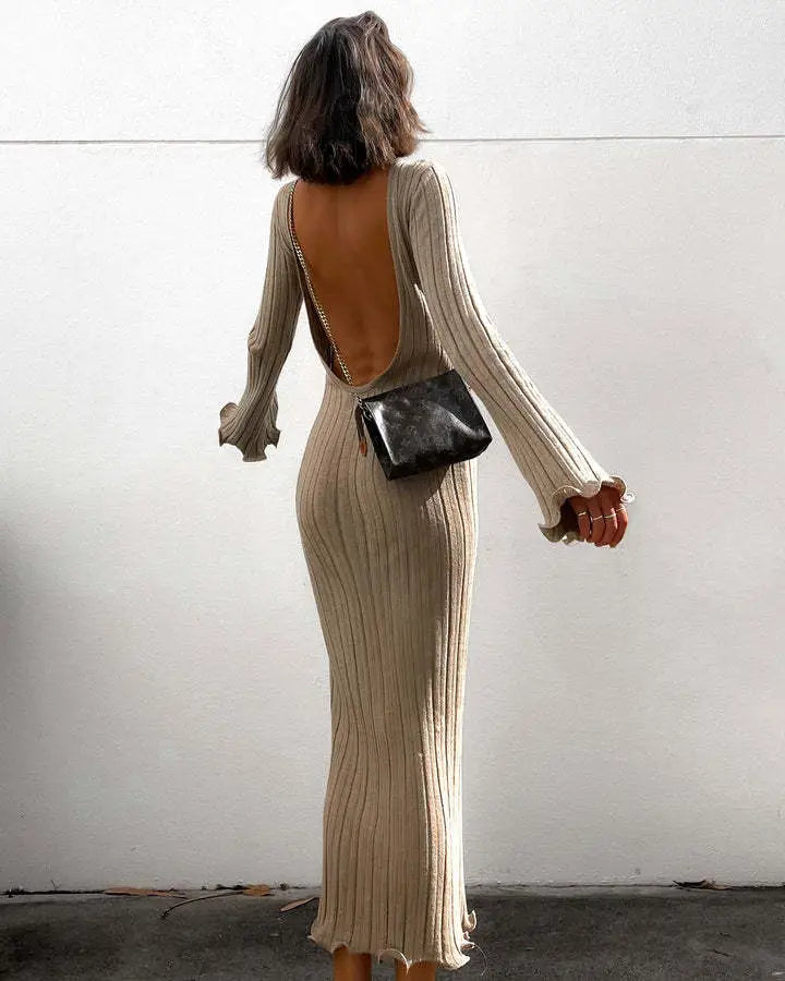 beige ribbed knit bodycon maxi dress with backless design and flared cuffs shown from the back
