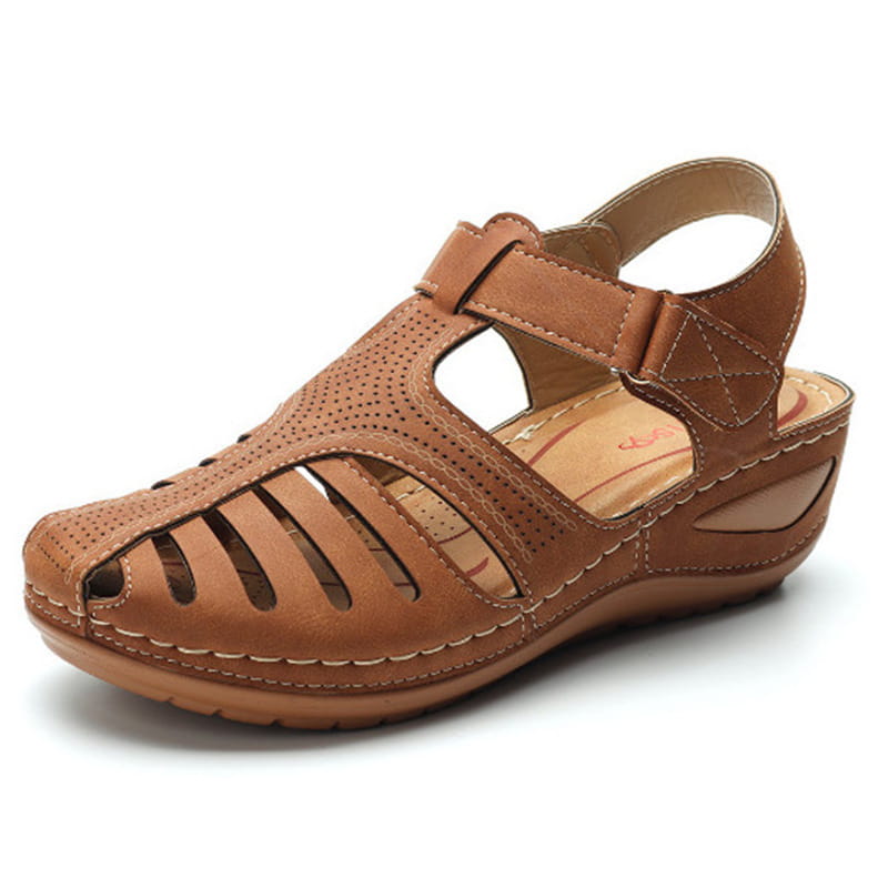 Tan leather retro wedge sandal for women plus size featuring a perforated and slotted T-strap design.