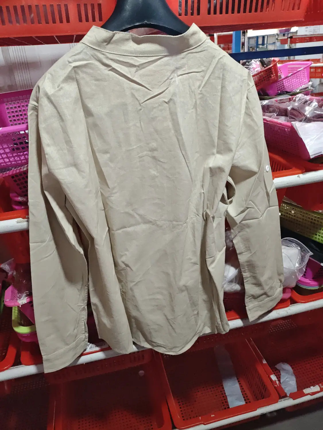 Beige loose linen blend breathable long sleeve sports shirt with a collar and subtle stitching details.