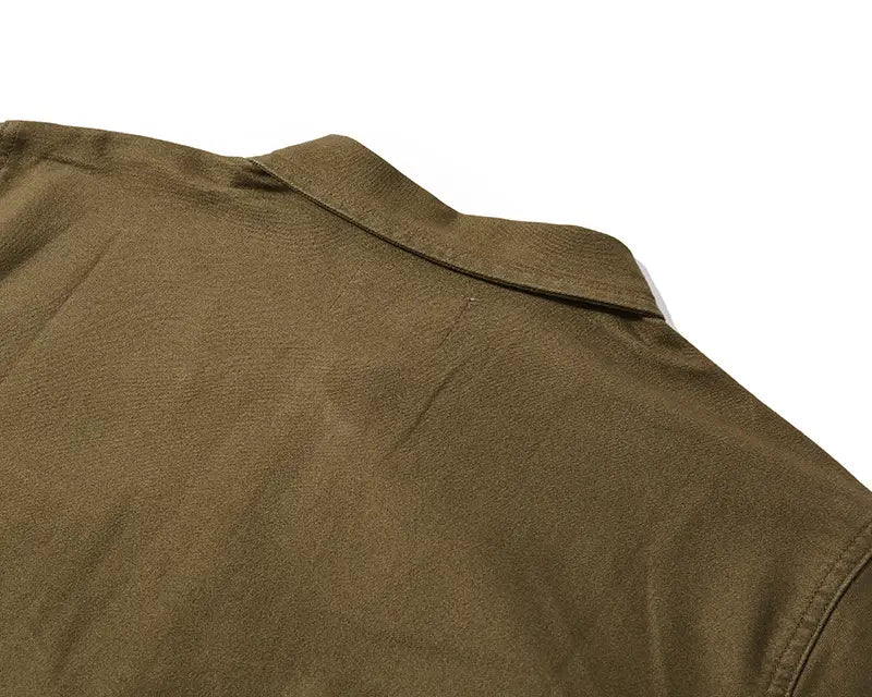 Mens french workwear jacket olive green cotton with classic collar and neat stitching utility pocket coat