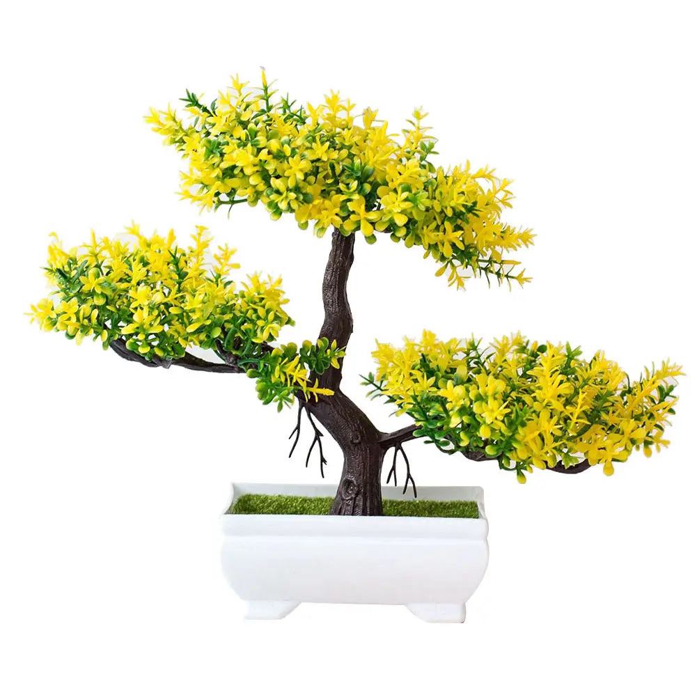 A miniature artificial bonsai tree with vibrant yellow blossoms and green foliage in a sleek white ceramic pot shown as part of a 4 pack.