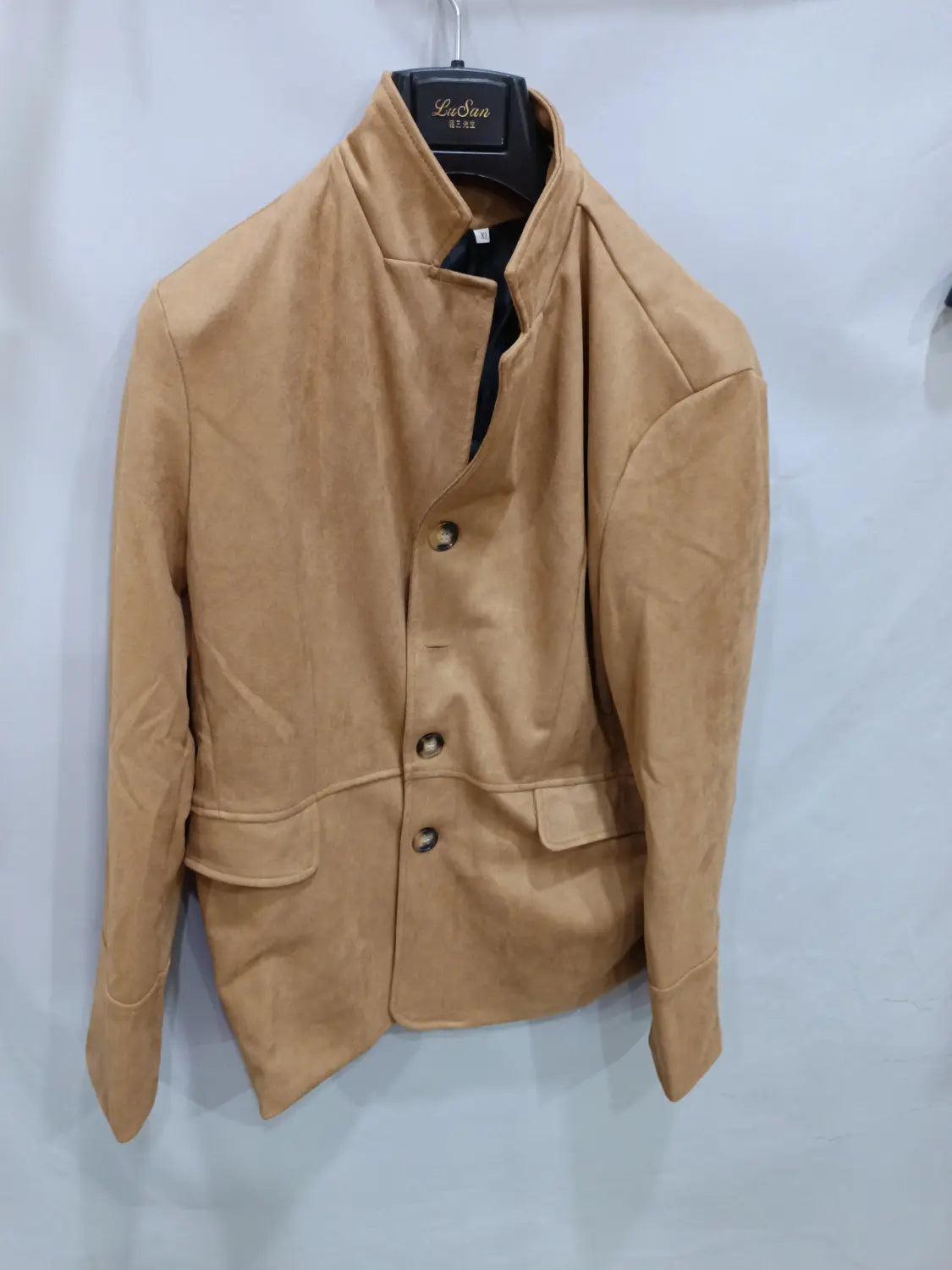 Men’s tan suede retro casual blazer jacket featuring a stand-up collar and dark buttons.