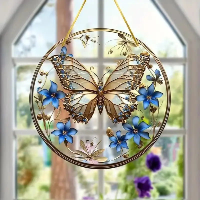 Butterfly acrylic wall art floral hanging decor featuring a delicate gold-toned butterfly ornament with blue flowers and intricate detailing suspended by a golden cord.