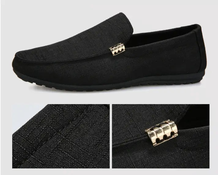 Mocassin à enfiler pour homme en toile noire à texture, avec détail de boucle métallique ton or.