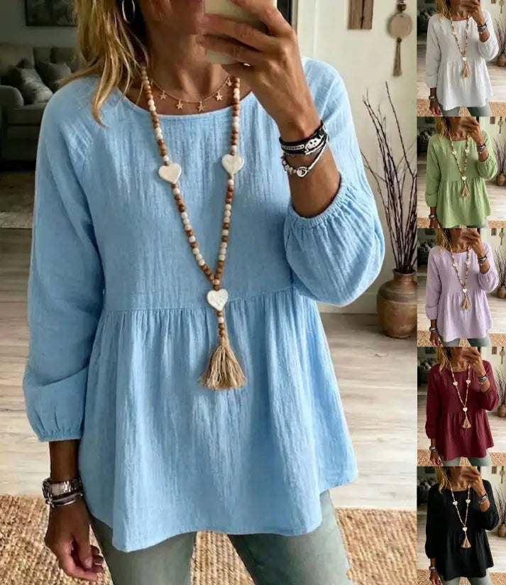 Hellblaues Baumwoll-Doll-Shirt im Casual-Stil mit langen Ärmeln, lockerer Passform, geraffter Taille und elastischen Bündchen.
