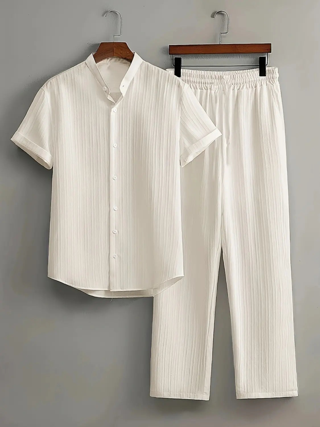 mens pleated short sleeve shirt and pants set in white cotton featuring a pleated design with short sleeves and matching pants.