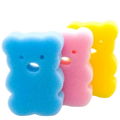 Baby bath sponge animal mitt made of soft foam in blue pink and yellow with cute bear faces for gentle shower use