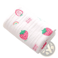 White cotton gauze baby bath towel swaddle blanket with pink and green strawberry prints and embroidered text