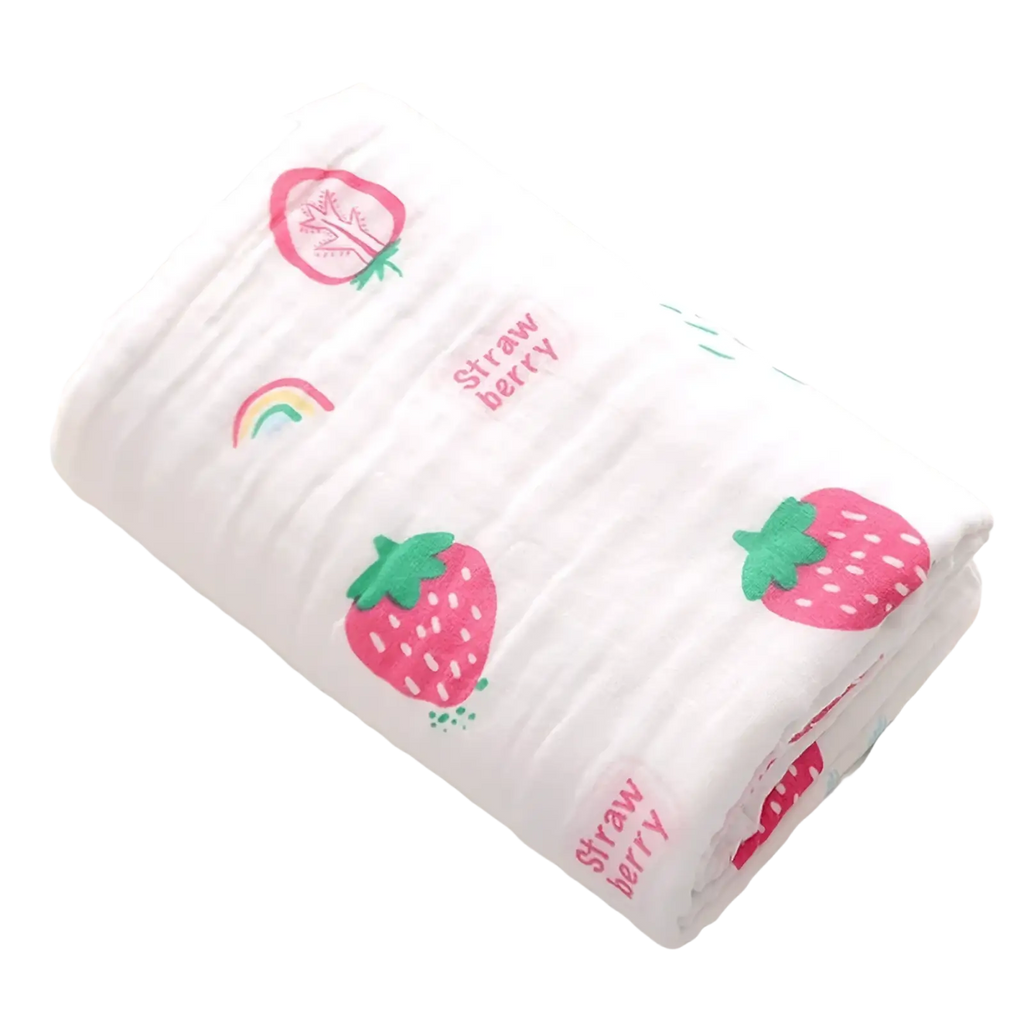 White cotton gauze baby bath towel swaddle blanket with pink and green strawberry prints and embroidered text