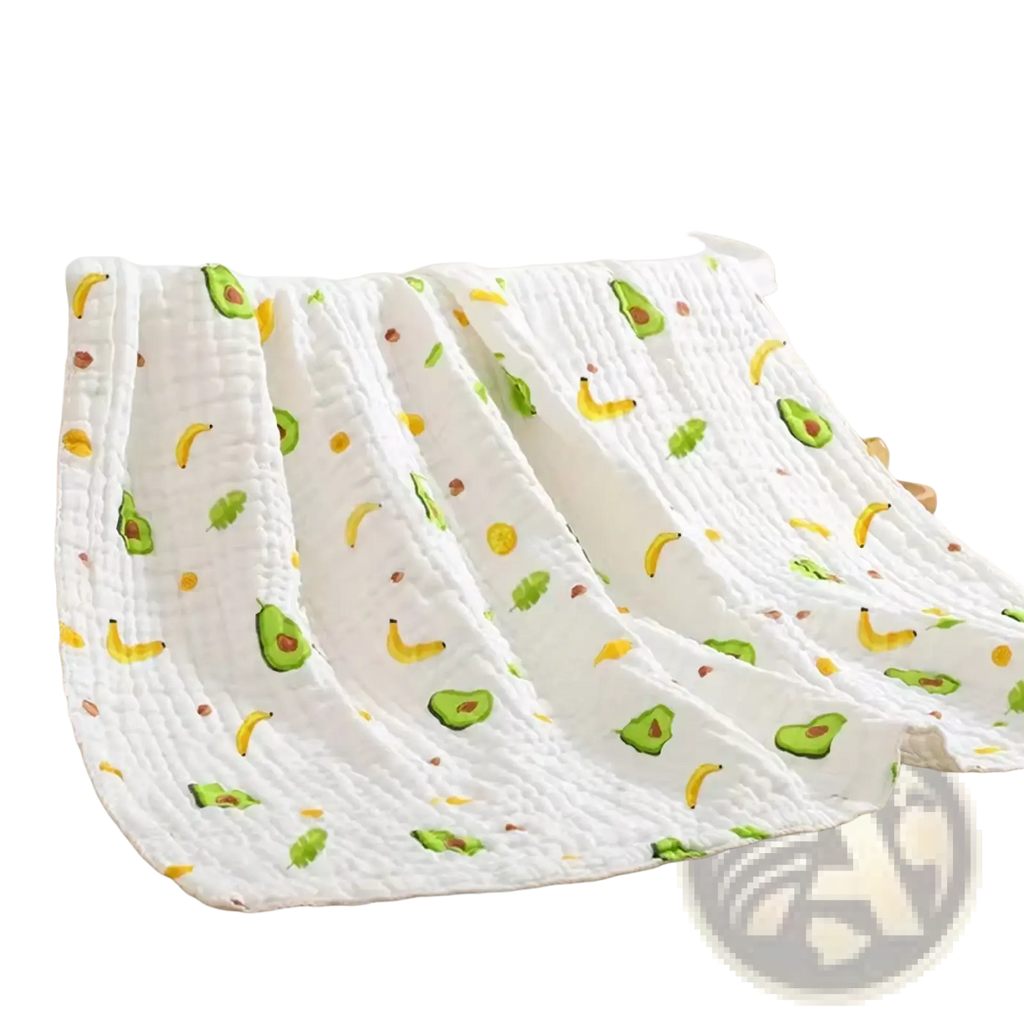 White quilted cotton gauze burp cloth with green avocado and yellow banana pattern for baby bath and swaddle use