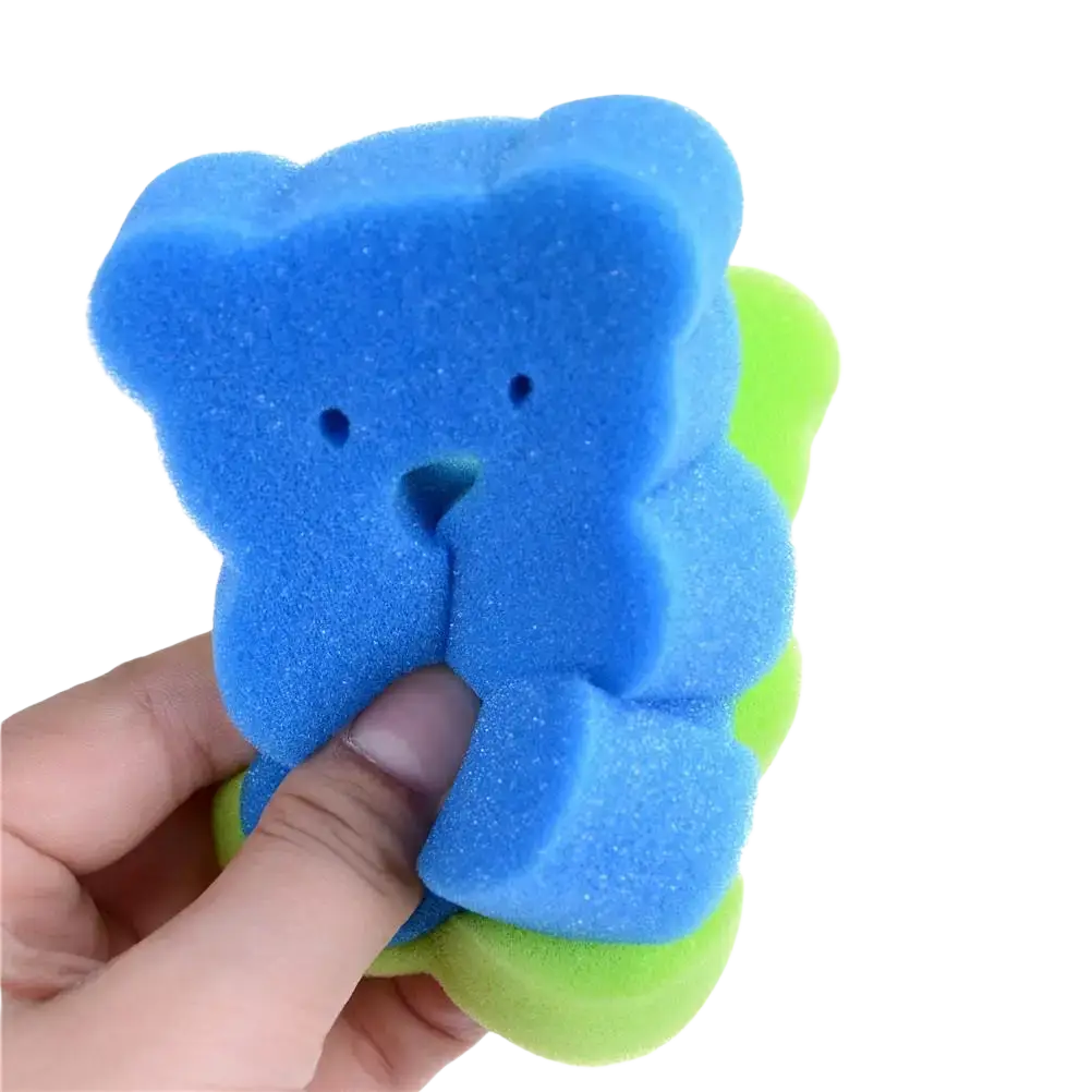 Blue foam baby bear bath sponge with soft foam texture black dot eyes and blue triangular nose for gentle shower use
