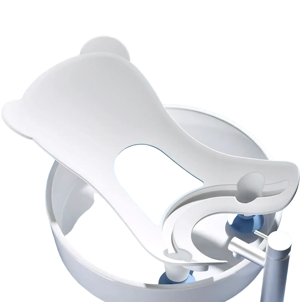 White bear-shaped baby bum washer bath support with light blue accent panel and soft rounded edges for newborn cleaning