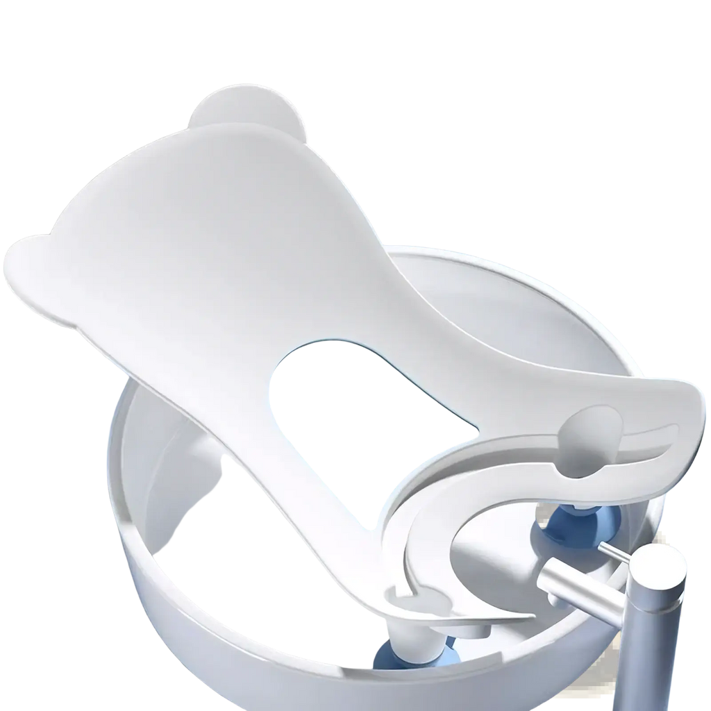 White bear-shaped baby bum washer bath support with light blue accent panel and soft rounded edges for newborn cleaning
