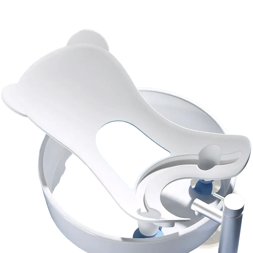 White bear-shaped baby bath support with light blue accent panel for infant bathing and washing basin use