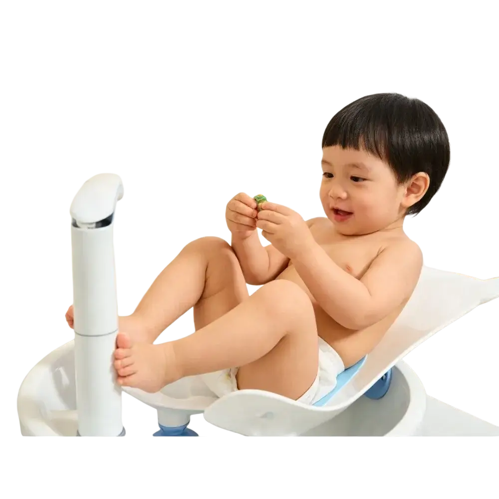 White plastic baby buttocks washing tub with blue accents and built-in faucet for infant bath support