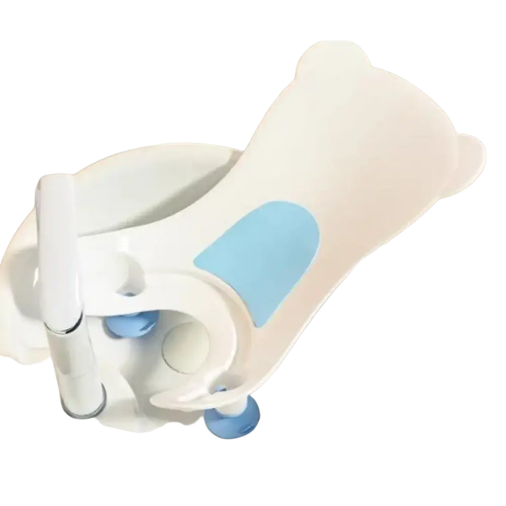 White plastic baby buttocks washing tub with light blue padded accent and suction cups for stability and safety