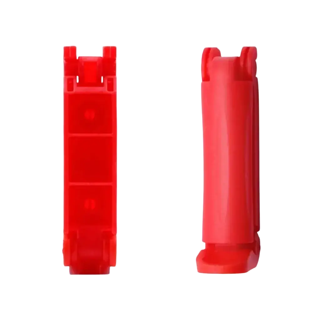 Red plastic clip-on baby car seat belt clip anti-skid lock showing rectangular and cylindrical profiles