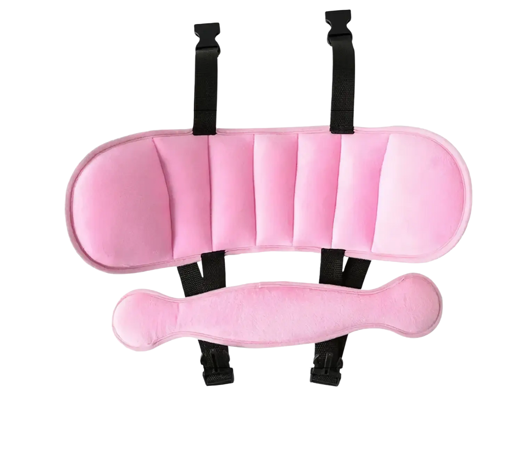 Pink plush baby car seat head support with black adjustable straps designed for sleep aid comfort and safety