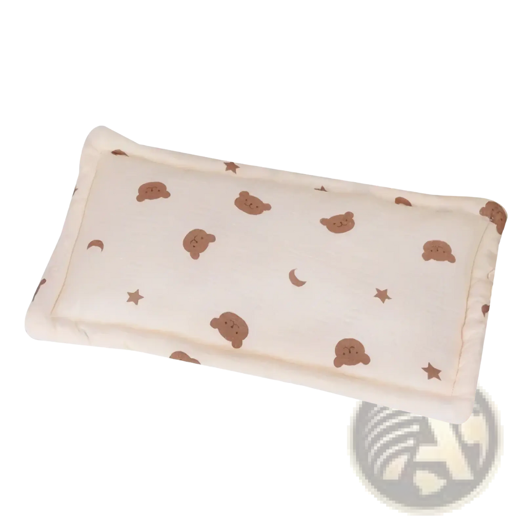 Cream-colored rectangular baby cotton pillow with breathable soft plush fabric featuring brown teddy bear and star patterns