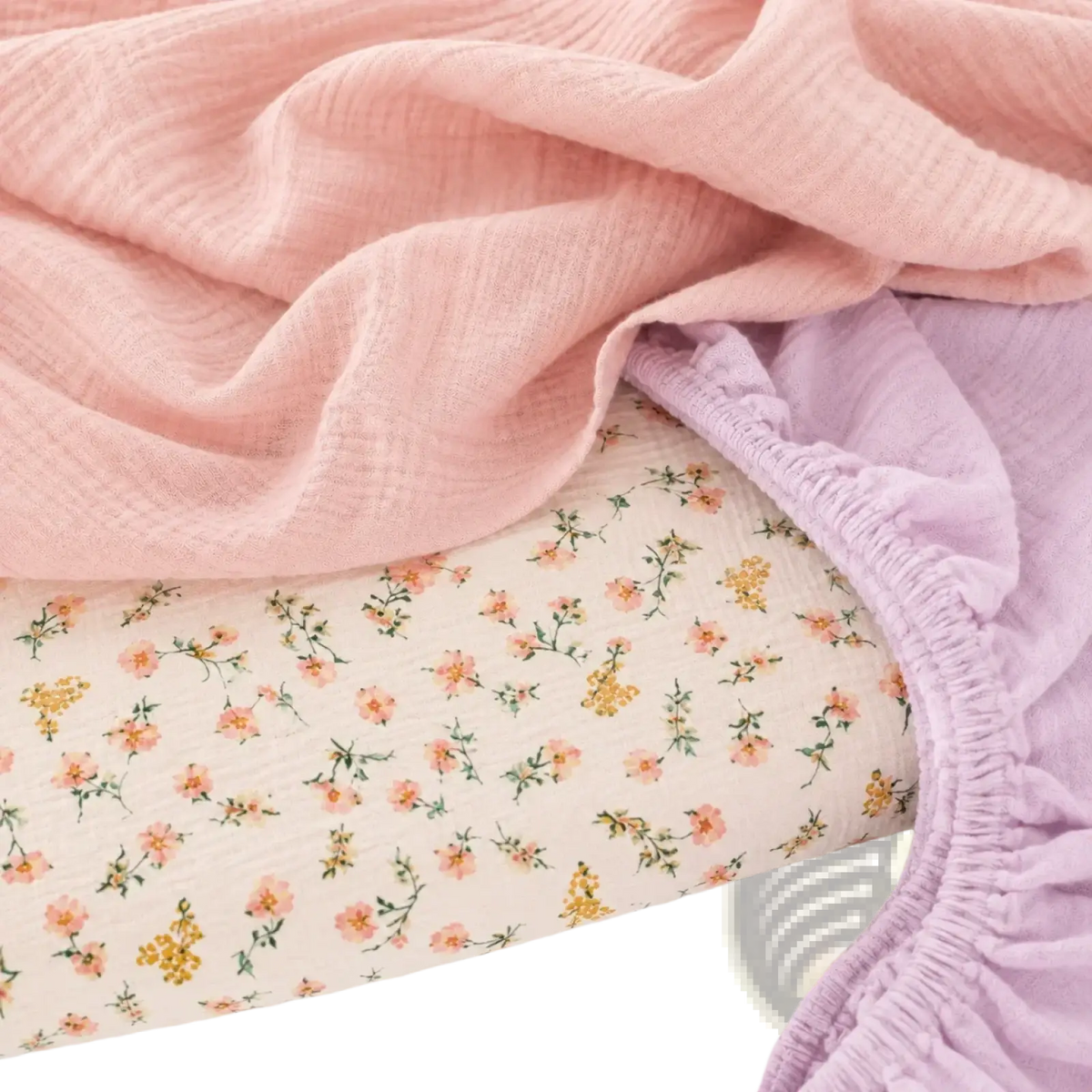 Baby crib mattress cover breathable fitted sheet in soft pink and lavender gauze fabric with delicate peach floral pattern