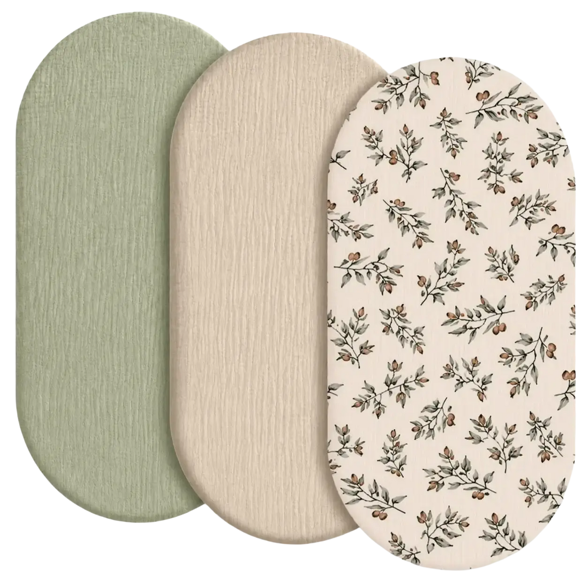 Three oval baby crib mattress covers breathable fitted sheets in sage green, beige textured fabric, and botanical print