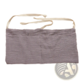 Baby crib storage bag bedside organizer made of soft lavender cotton fabric with two front pockets and adjustable straps