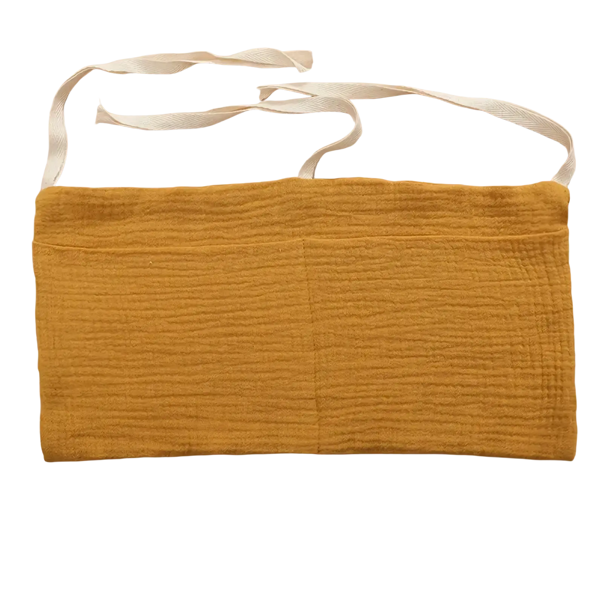A mustard-yellow textured cotton baby crib storage bag with white fabric ties for bedside organization
