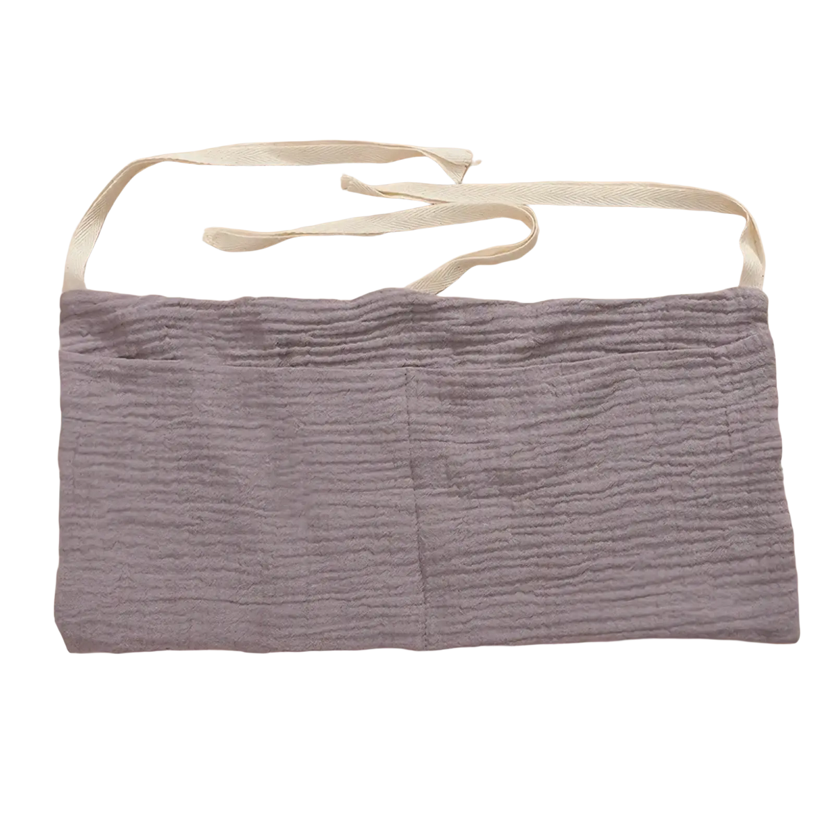 Baby crib storage bag bedside organizer made of soft lavender cotton fabric with two front pockets and adjustable straps