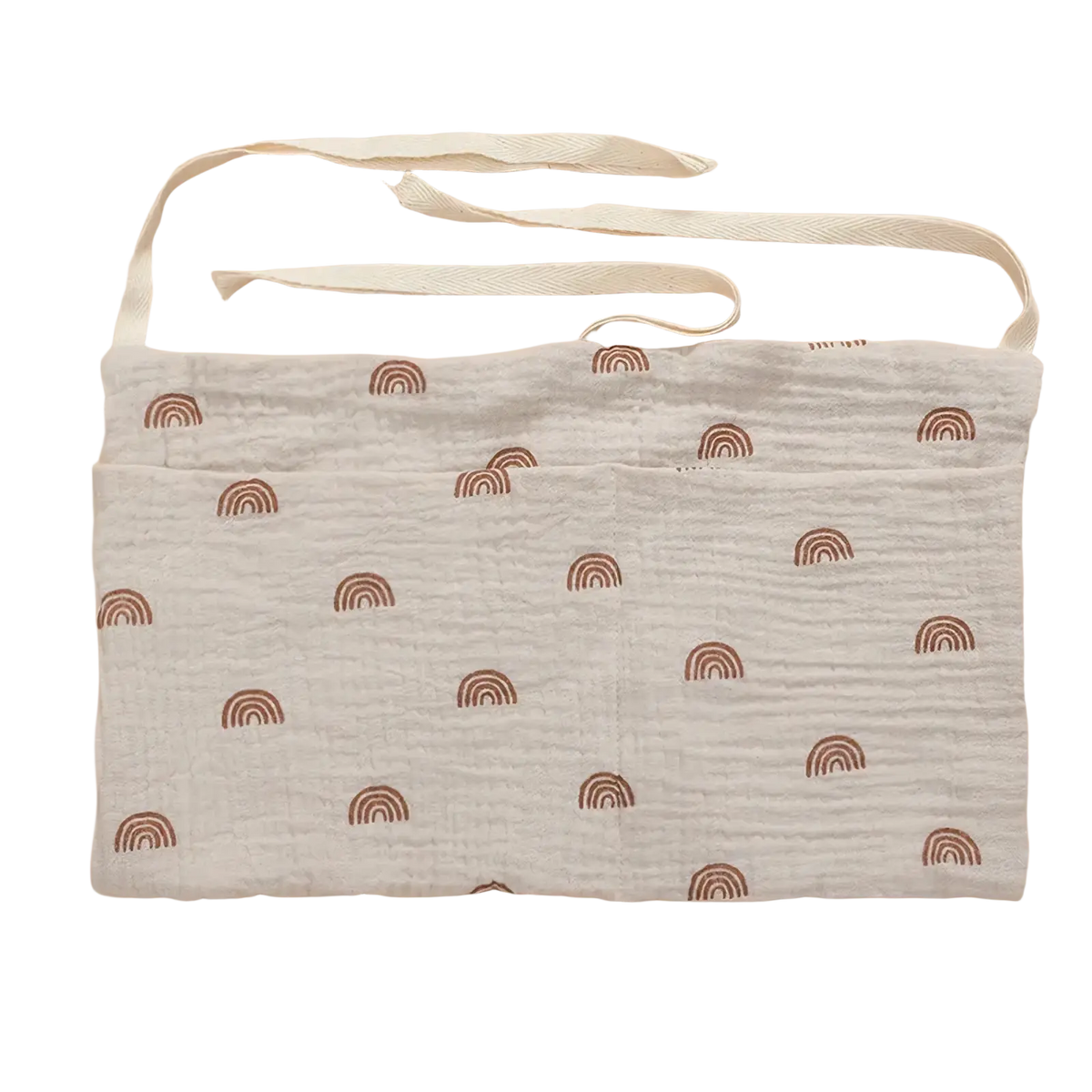 Baby crib storage bag cotton bedside organizer with a soft off-white muslin apron featuring brown rainbow patterns