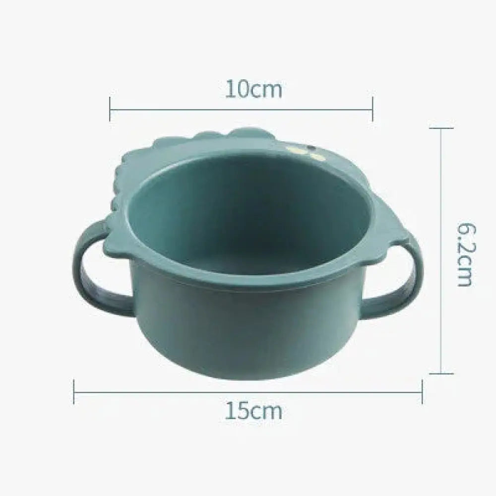 Teal-colored plastic baby feeding bowl with two handles and decorative lid from 3-compartment silicone dinosaur toddler feeding set