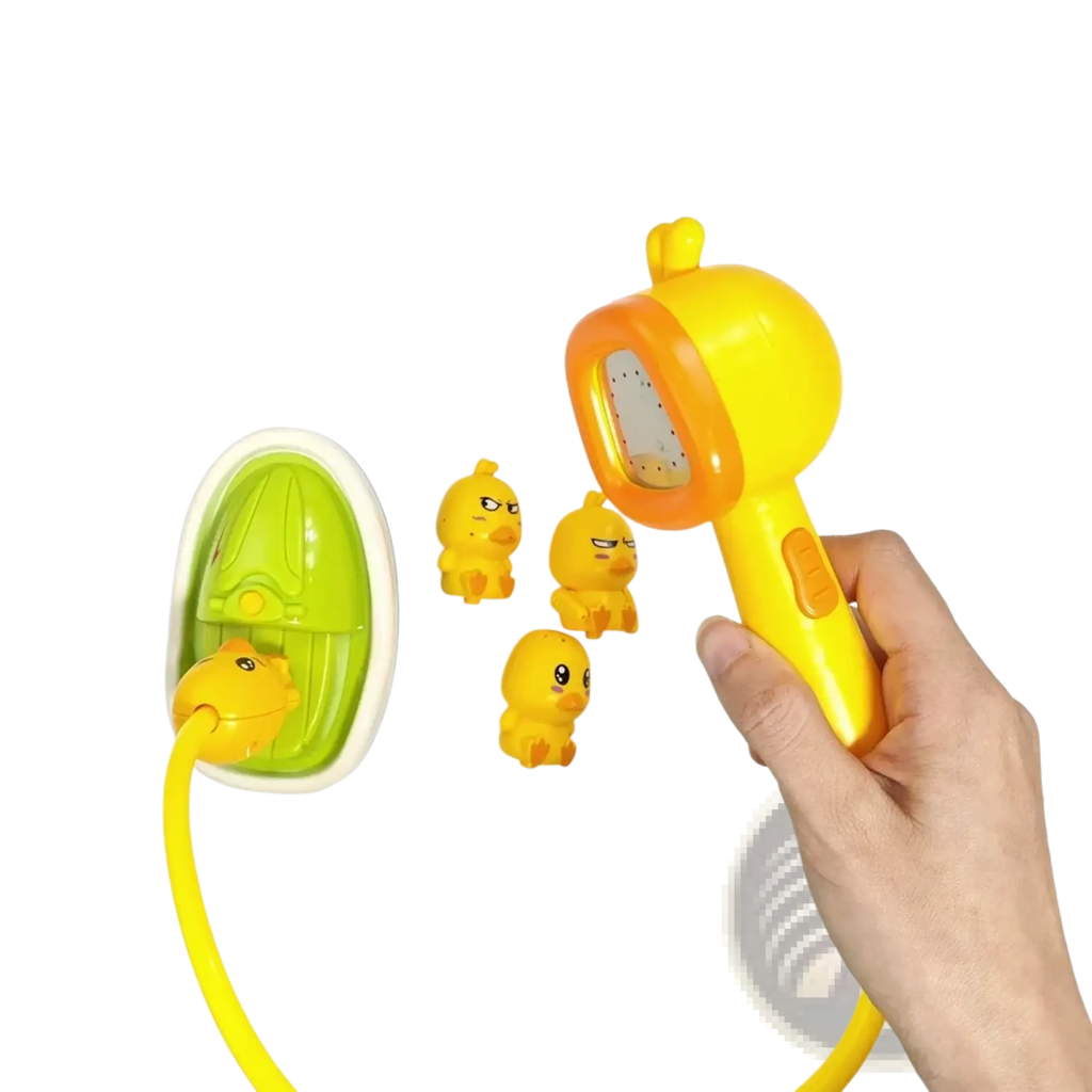 Yellow duck-shaped plastic baby bath sprayer toy with orange accents and green matching bath toy base
