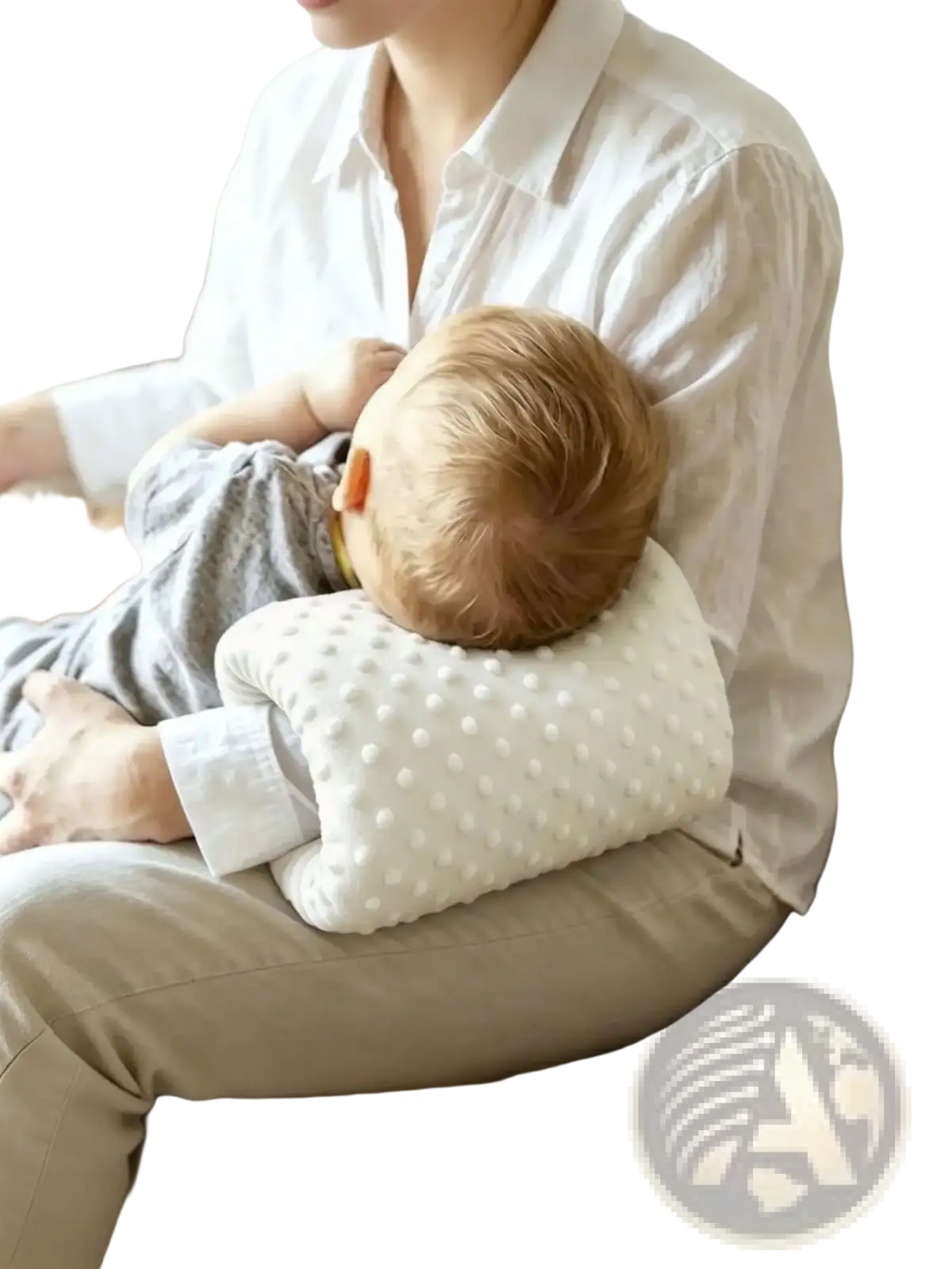 White textured baby feeding arm pillow with soft rounded contours and dotted surface for nursing support cushion