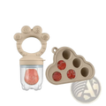Beige silicone baby fruit feeder and freezer tray set with clear container holding pink fruit puree and cloud mold