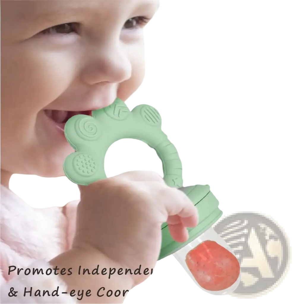 Mint-green silicone baby fruit feeder with textured flower top and clear base holding red fruit puree in freezer tray set