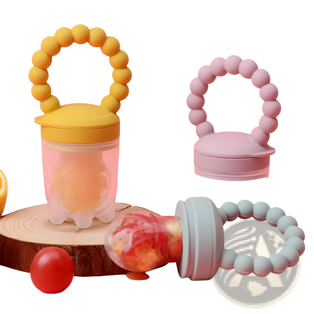 Yellow silicone baby fruit feeder with clear plastic body and rounded bead handle for teething and feeding