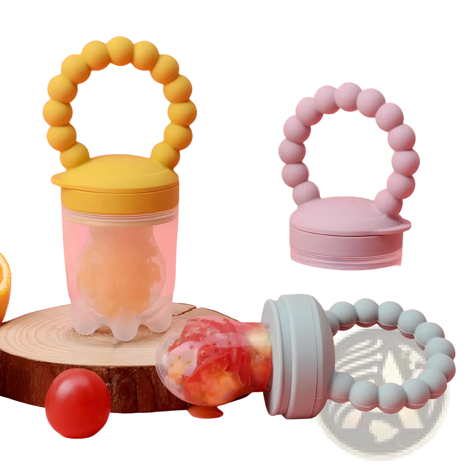 Yellow silicone baby fruit feeder with clear plastic body and rounded bead handle for teething and feeding