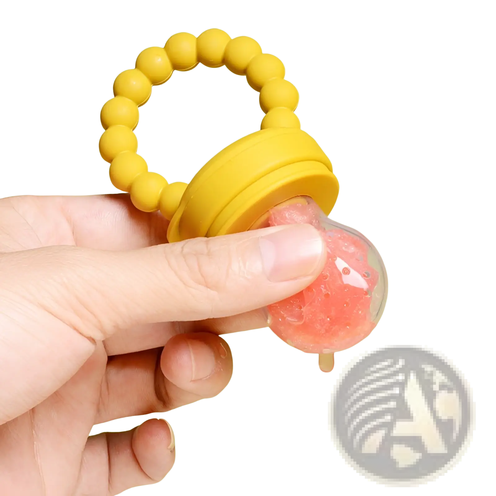 Yellow silicone baby fruit feeder teether pacifier set with clear compartment containing pink fruit puree