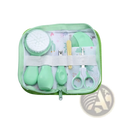 Baby grooming kit and healthcare set in mint green with soft silicone handles and floral-patterned interior lining