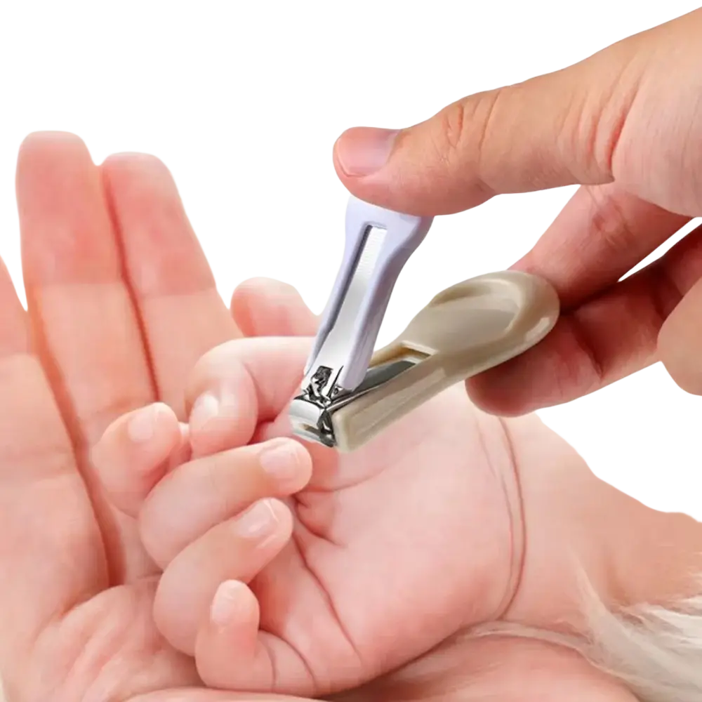 A baby grooming kit newborn care set with a light gray and beige child-safe nail clipper trimming fingernails