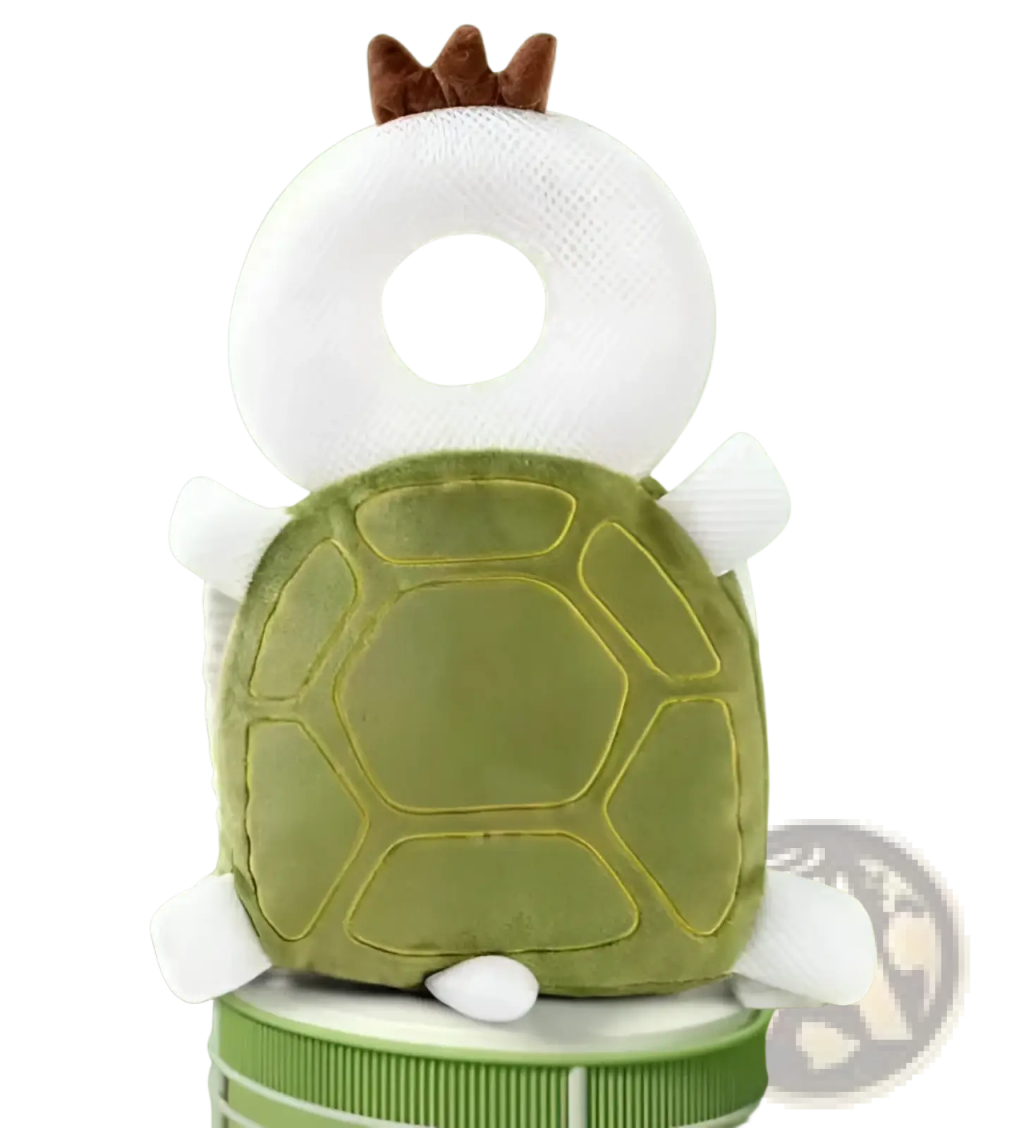 A plush green turtle-shaped baby head protector backpack cushion with white limbs and a brown crown for safety