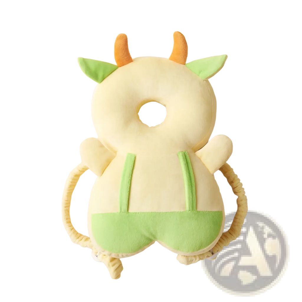 Cream-colored plush dinosaur baby head protector with green ears horns and belly patch for toddler fall protection