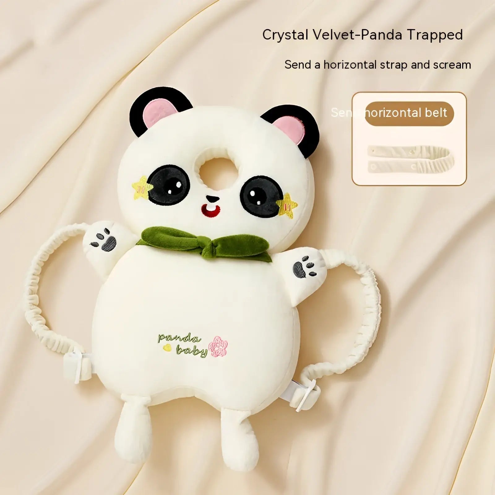A plush white panda-shaped baby head protector pillow with black ears green velvet bow tie and embroidered panda baby text