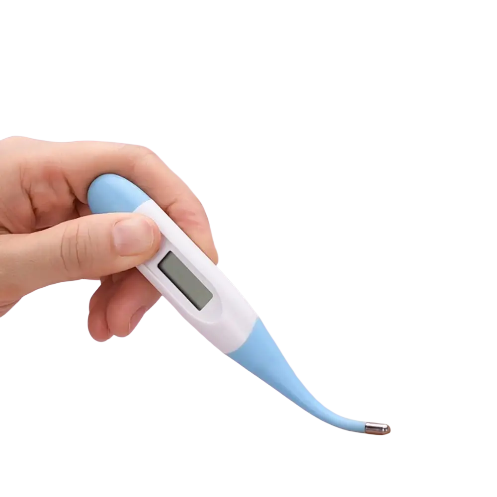 A light blue and white digital thermometer with a soft tip probe held in hand from a baby healthcare grooming kit with eva case