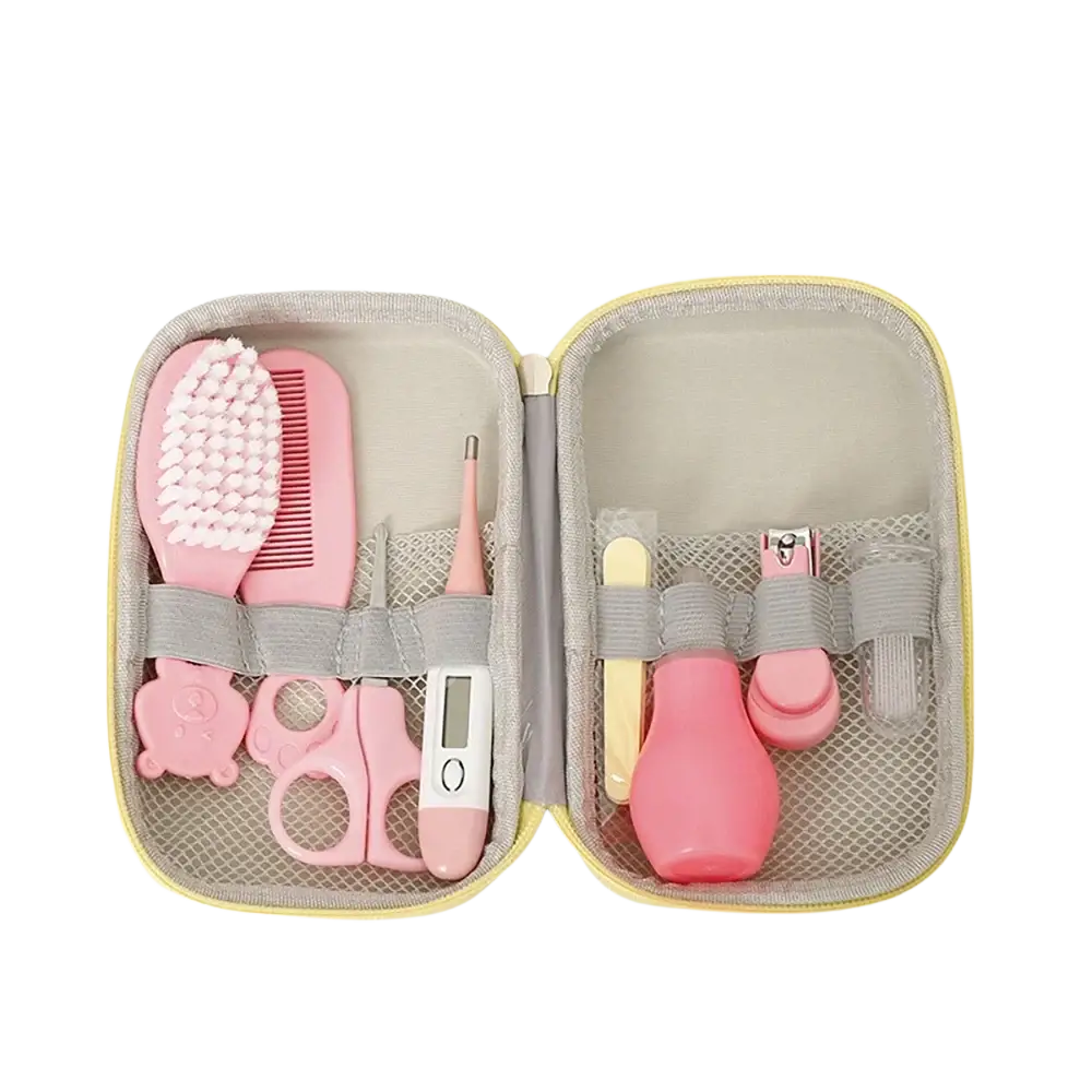 Pink baby healthcare grooming kit with soft silicone and plastic tools organized in gray mesh eva case