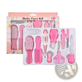 Baby healthcare and grooming kit in pink with soft-bristled brushes comb thermometer nail clipper and scissors