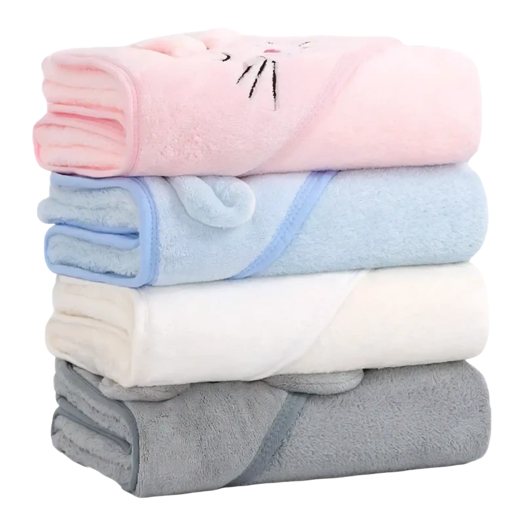 Stacked baby hooded animal bath towels in pastel pink blue white and gray plush coral fleece with embroidered cat faces