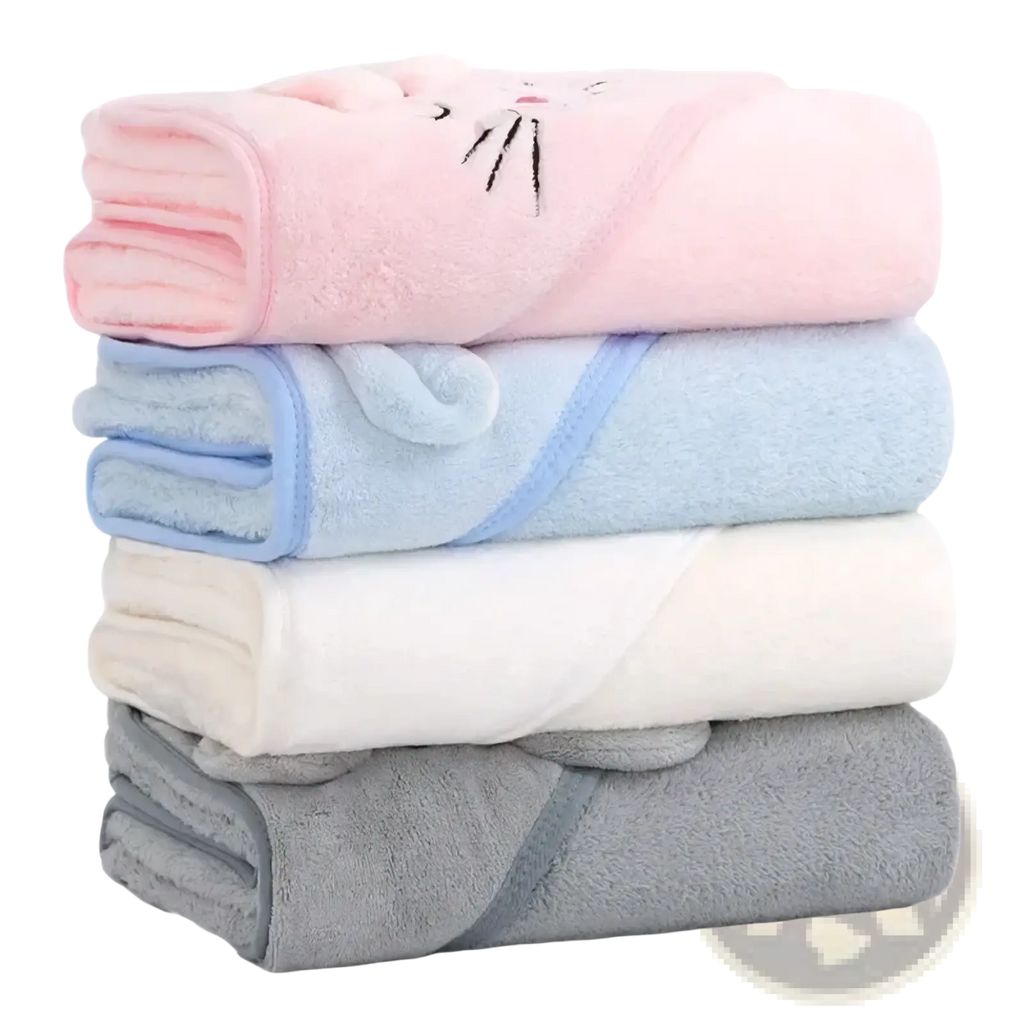 Stacked baby hooded animal bath towels in pastel pink blue white and gray plush coral fleece with embroidered cat faces