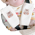 Cream-colored quilted fabric baby seat belt cover with embroidered cute cat faces shoulder pad for car safety