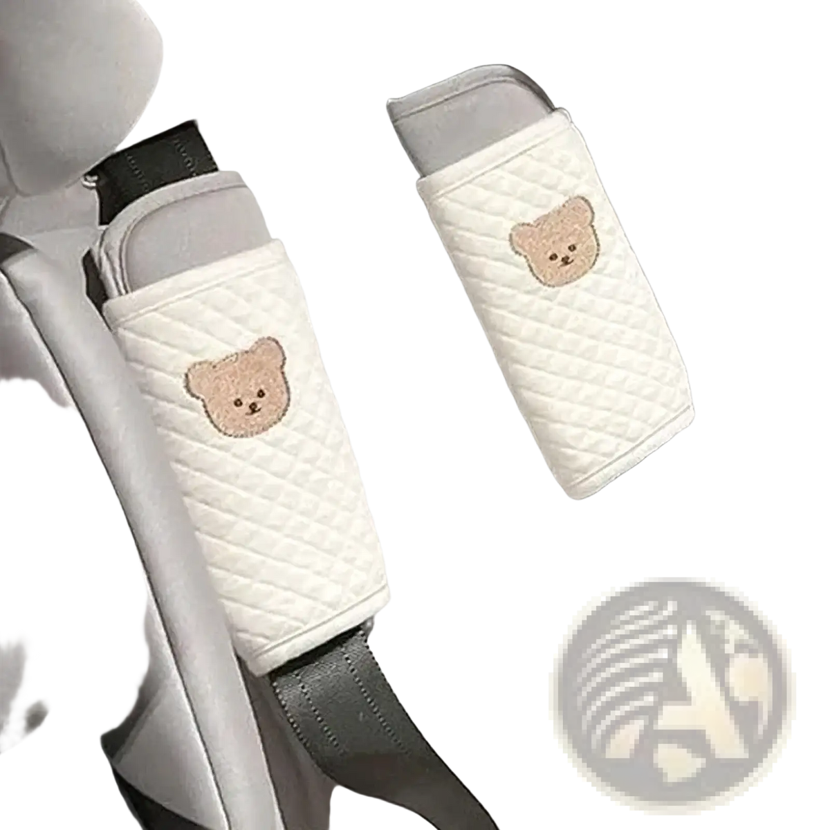 White quilted baby seat belt covers with embroidered beige bear faces designed as animal shoulder pads