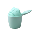 A mint green plastic baby shampoo rinse cup with a frog-shaped perforated lid and an integrated handle for bathing
